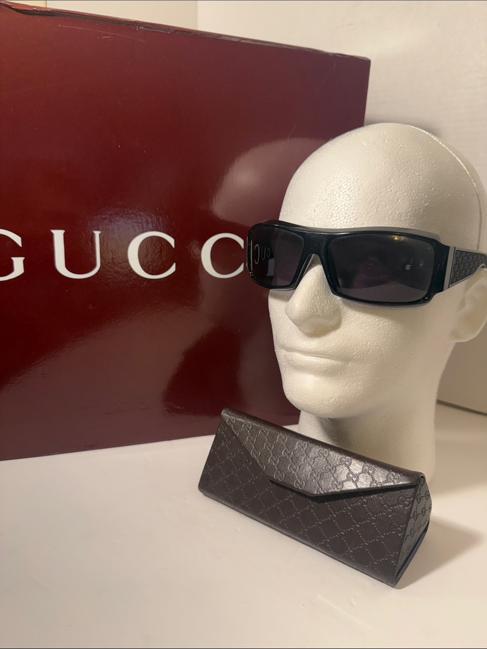 Vintage Gucci Black Sunglasses with Dark Lenses and Logo Temples